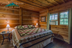 A queen size bed in the master first floor bedroom 
